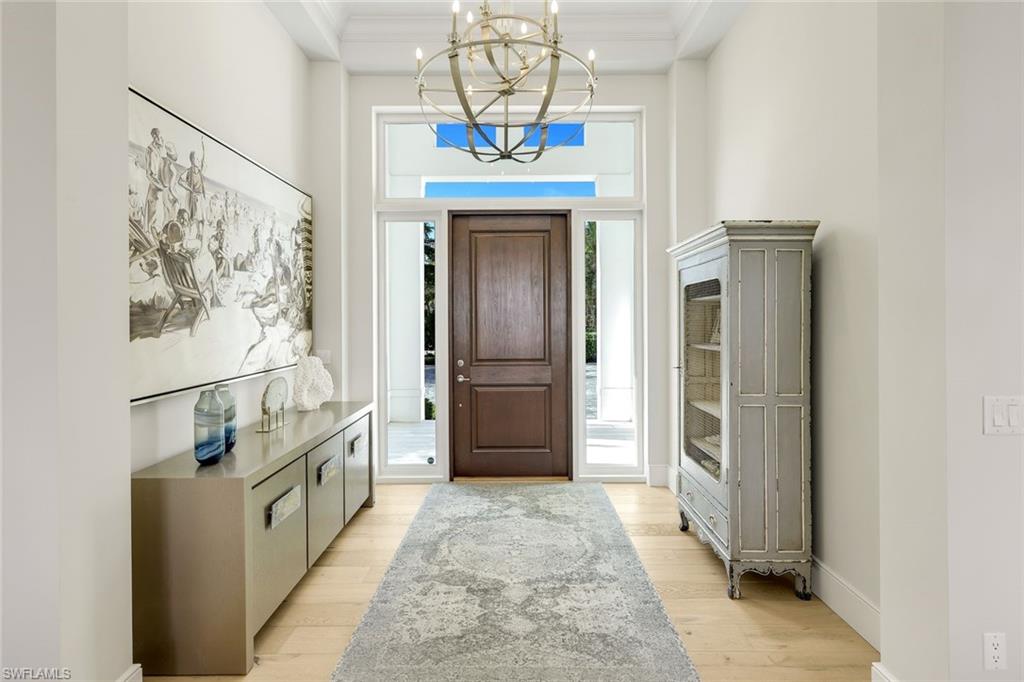 16415 Seneca Way Naples, FL 34110 - Photo 7 of 50 a view of a refrigerator in a kitchen