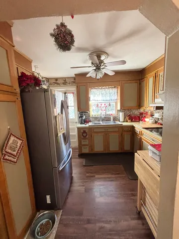 a bedroom with bed and window