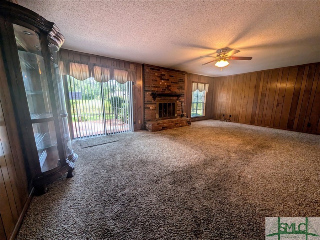 912 Woodpecker Road Savannah, GA 31410 - Photo 14 of 30 Family Room with wood burning fireplace