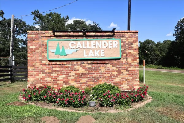 a street sign on the side of building