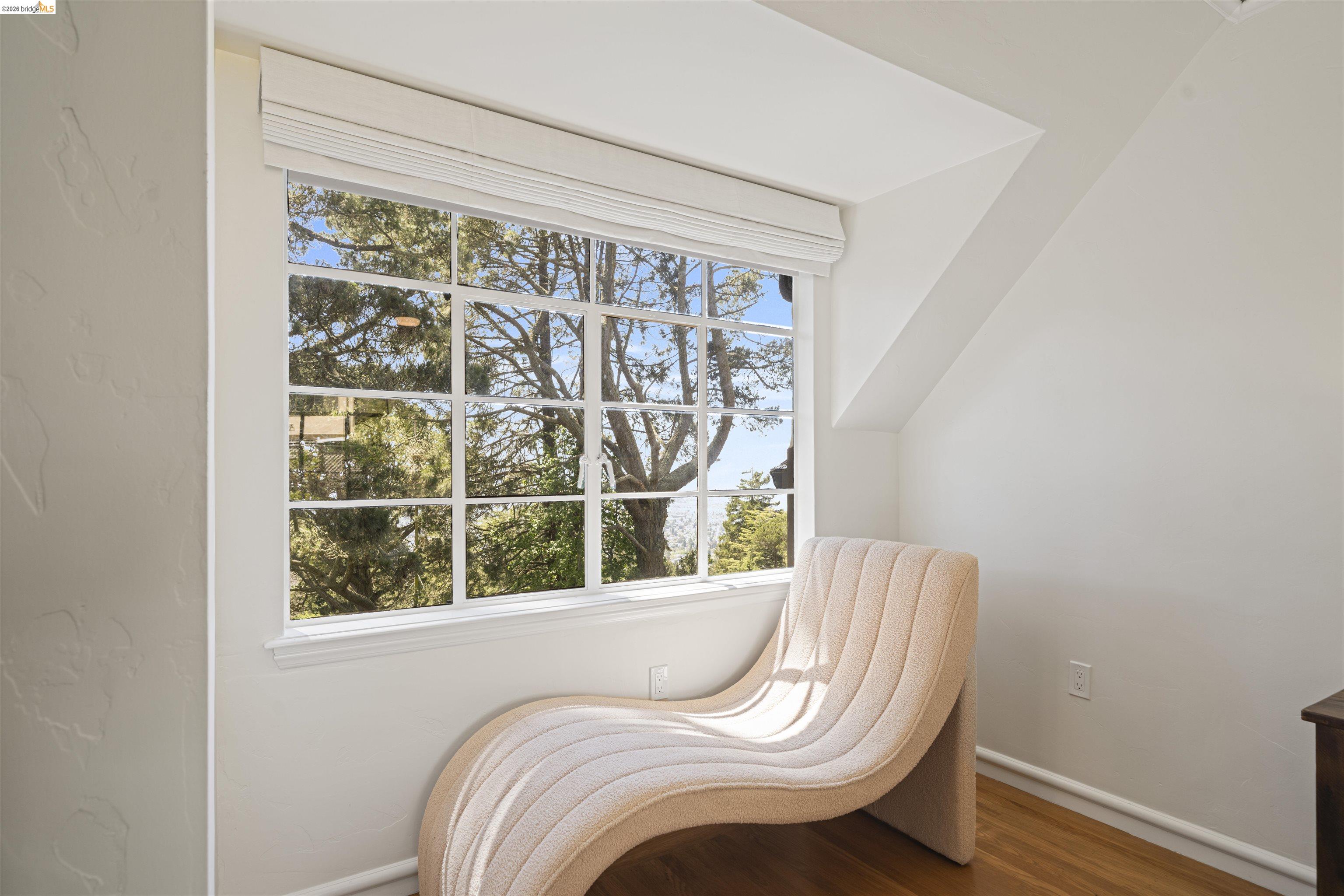 1170 Sterling Avenue Berkeley, CA 94708 - Photo 26 of 52 Living area with baseboards and wood finished floors