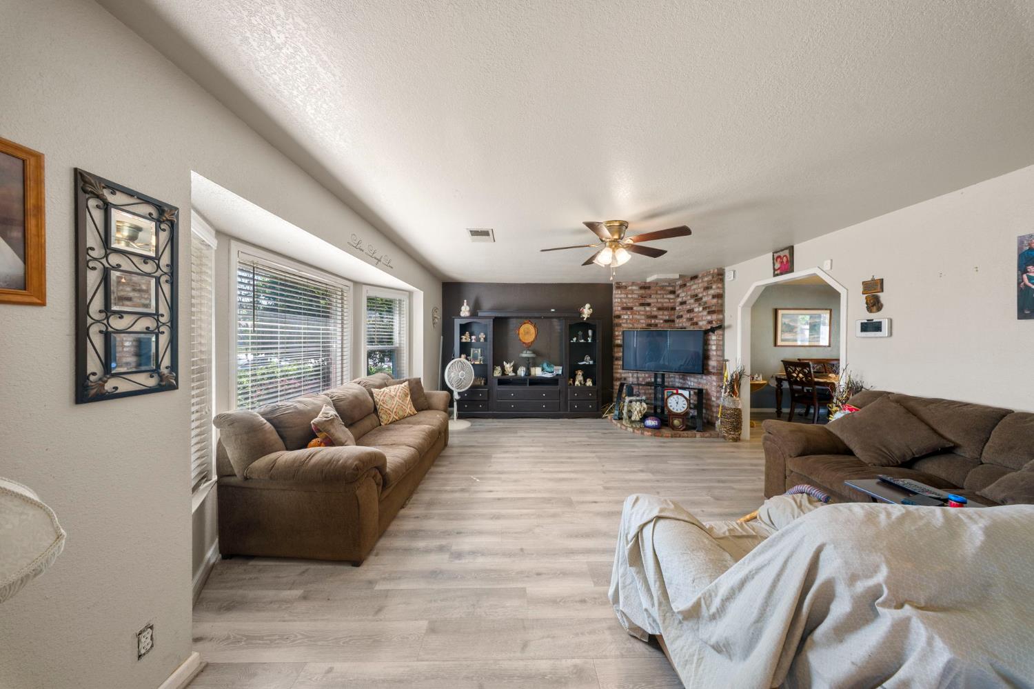 2779 Story Avenue Merced, CA 95340 - Photo 5 of 27 a living room with furniture and large windows