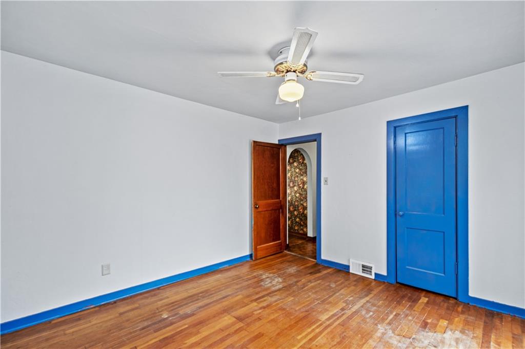 3910 Shepard Road Gibsonia, PA 15044 - Photo 12 of 25 a view of an empty room with wooden floor and window