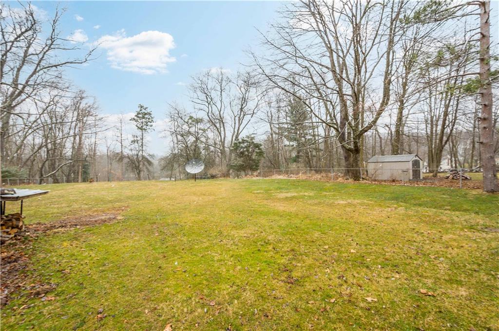 3910 Shepard Road Gibsonia, PA 15044 - Photo 23 of 25 a view of road with large trees