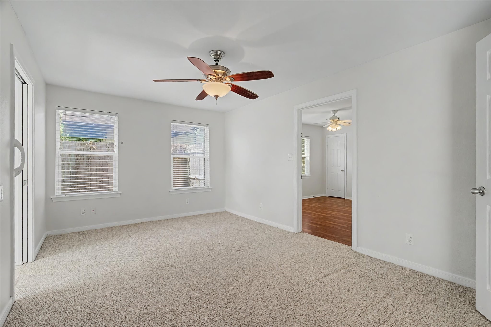 413 Farrer Street Angleton, TX 77515 - Photo 28 of 43 a view of an empty room with a window