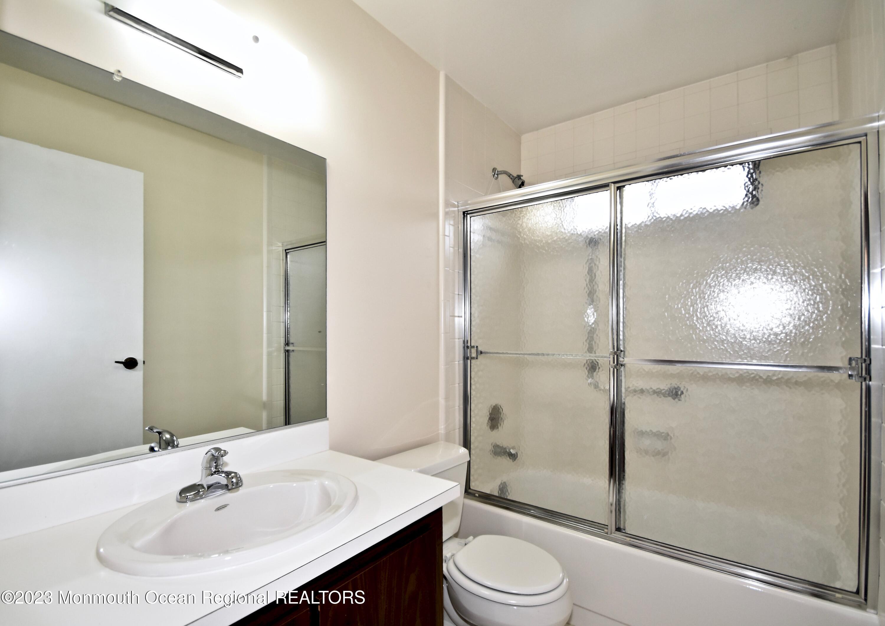 7 Flintshire Terrace Manchester Township, NJ 08759 - Photo 15 of 24 a bathroom with a sink toilet and shower