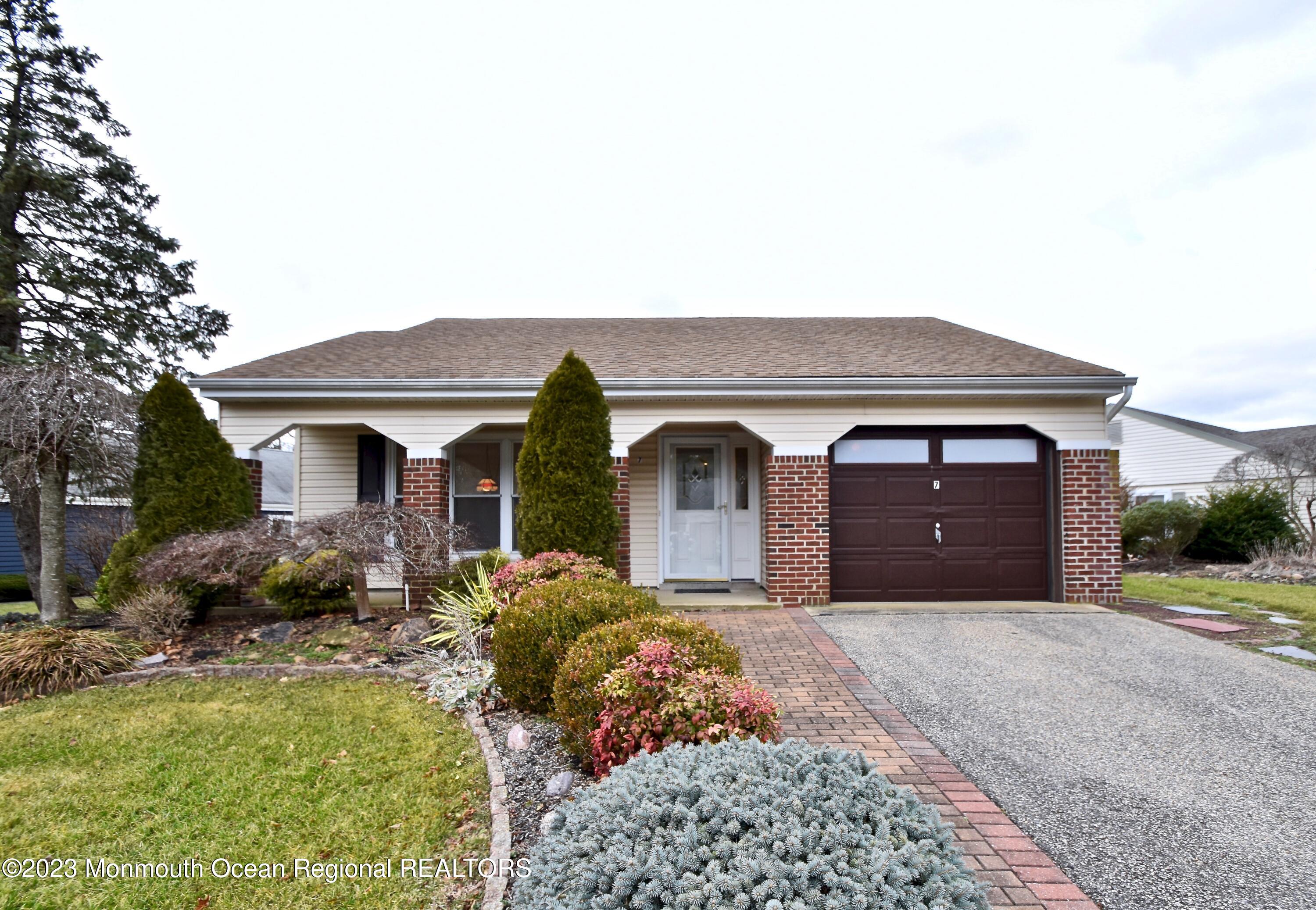 7 Flintshire Terrace Manchester Township, NJ 08759 - Photo 2 of 24 a front view of a house with a yard