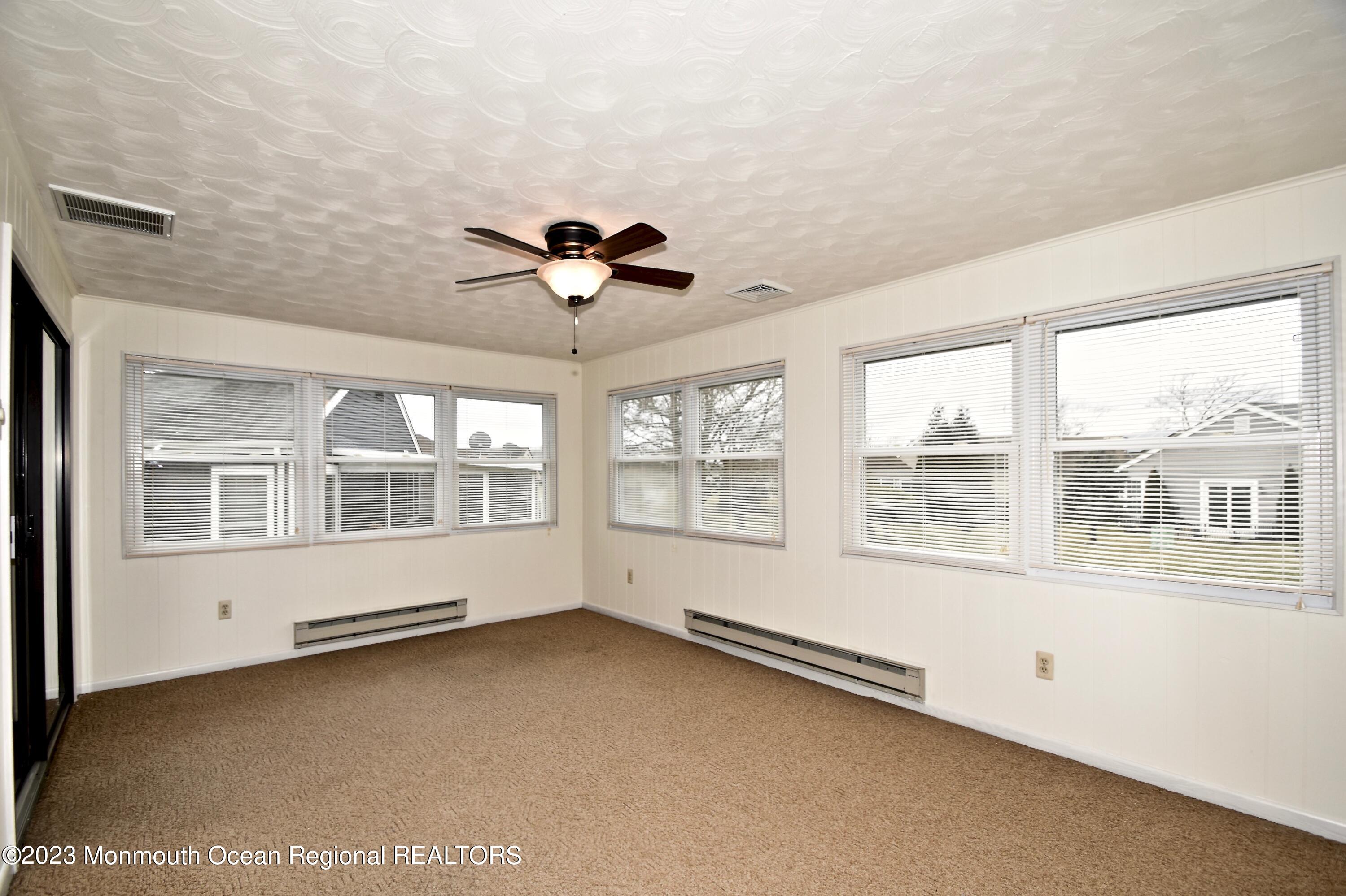7 Flintshire Terrace Manchester Township, NJ 08759 - Photo 22 of 24 a view of an empty room with a window