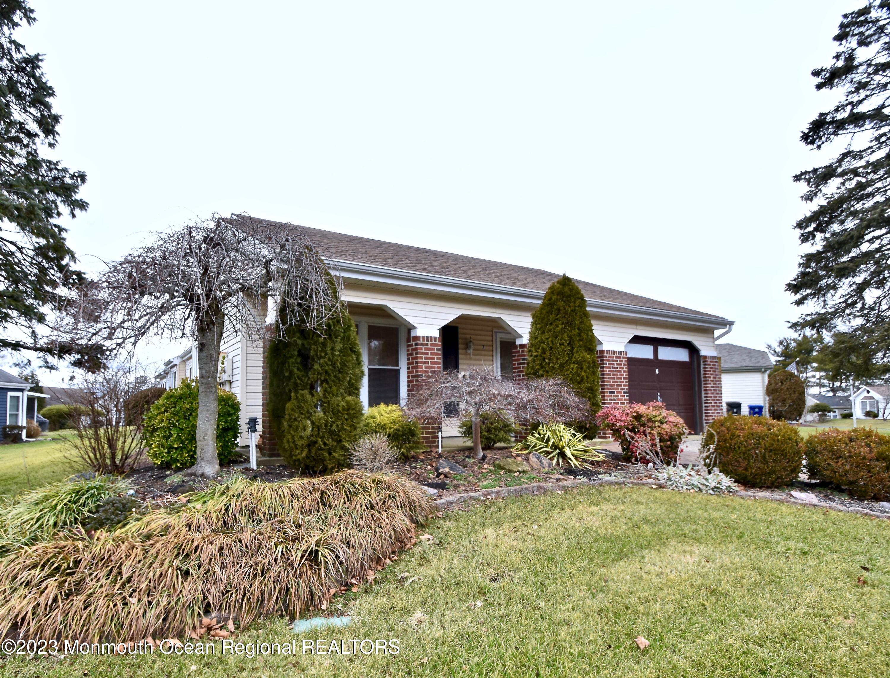 7 Flintshire Terrace Manchester Township, NJ 08759 - Photo 3 of 24 a front view of house with yard