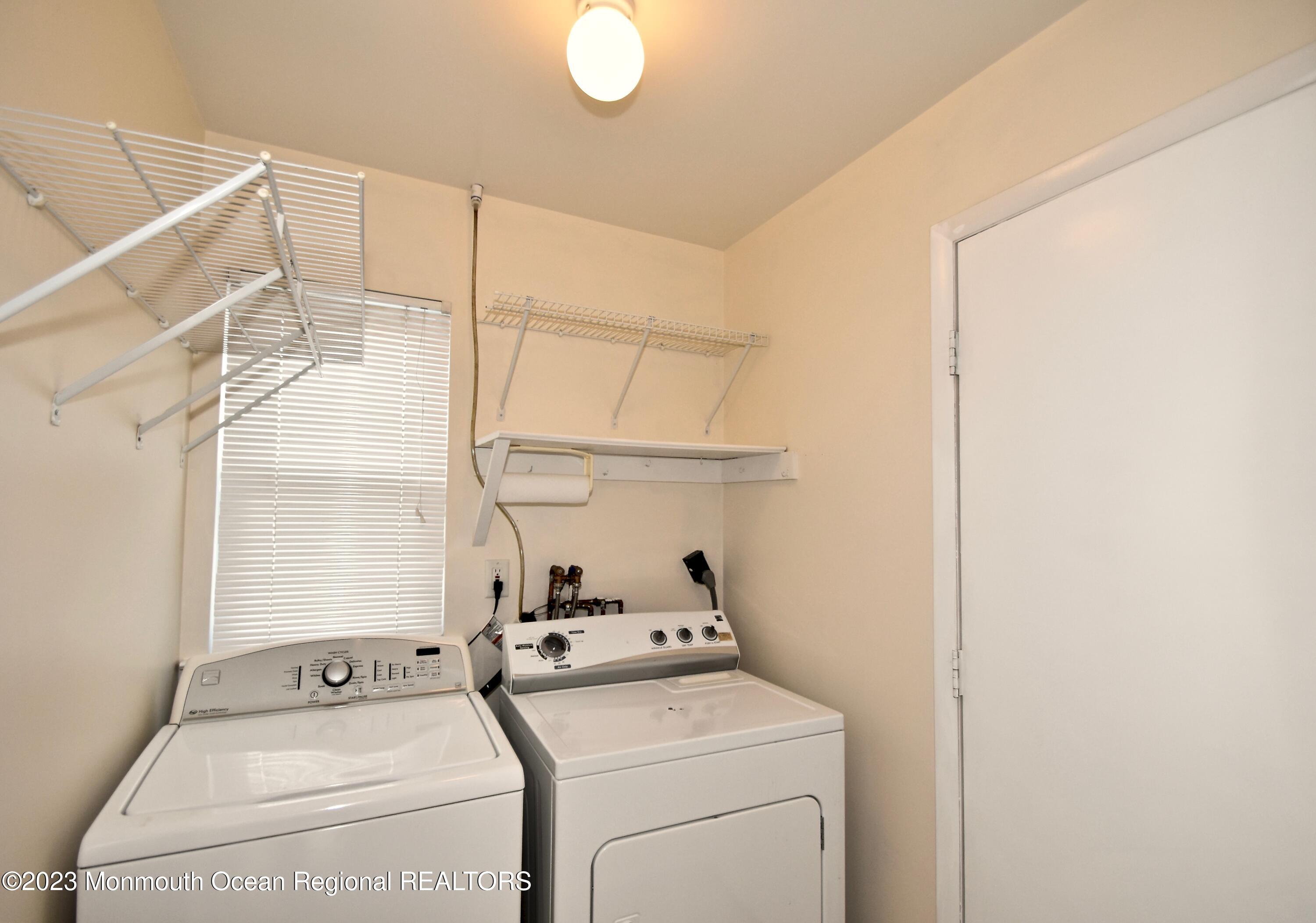 7 Flintshire Terrace Manchester Township, NJ 08759 - Photo 9 of 24 a utility room with dryer and washer