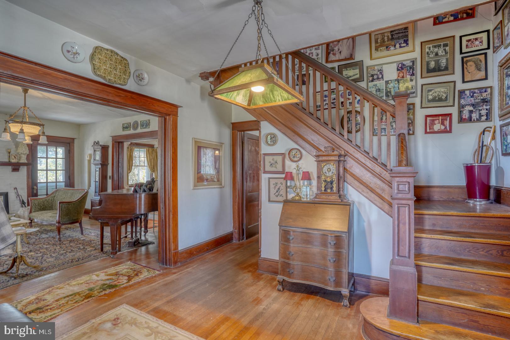 4096 Main Street Trappe, MD 21673 - Photo 20 of 70 a view of entryway livingroom and hall with wooden floor