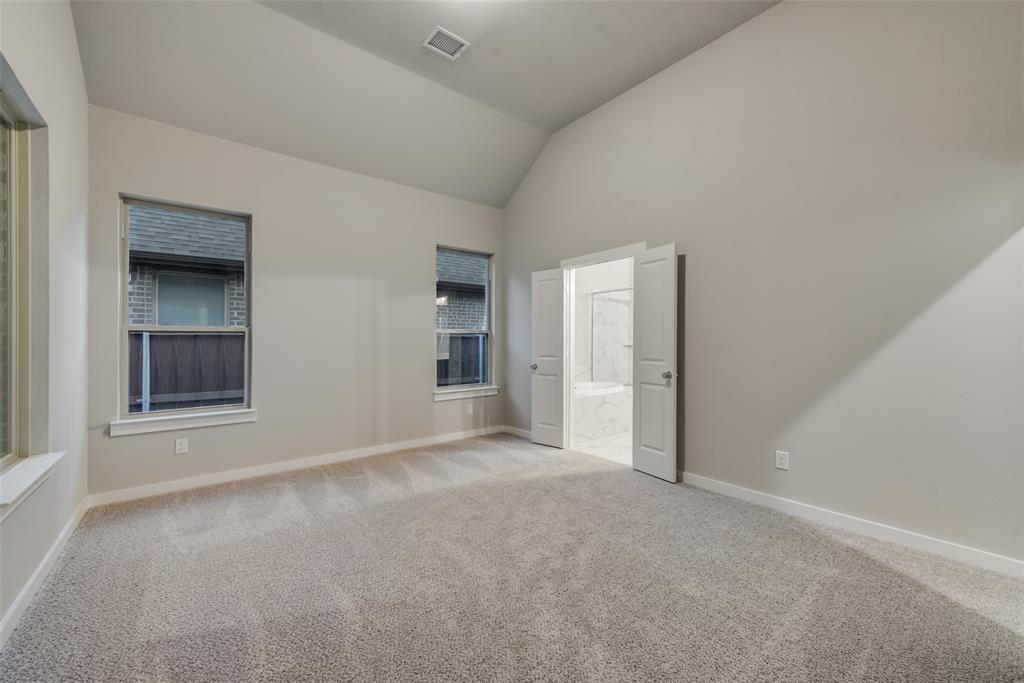 527 Embargo Drive Fate, TX 75189 - Photo 11 of 18 an empty room with windows and closet