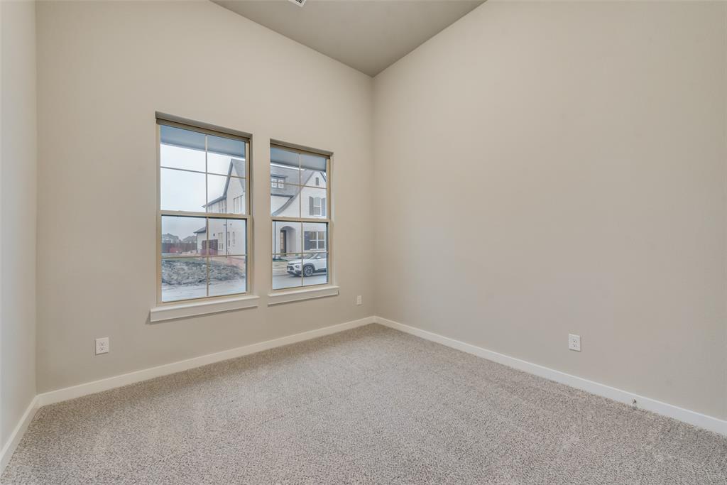 527 Embargo Drive Fate, TX 75189 - Photo 15 of 18 an empty room with a window