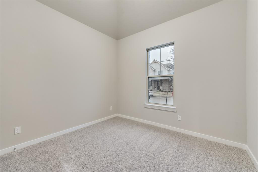 527 Embargo Drive Fate, TX 75189 - Photo 17 of 18 an empty room with windows