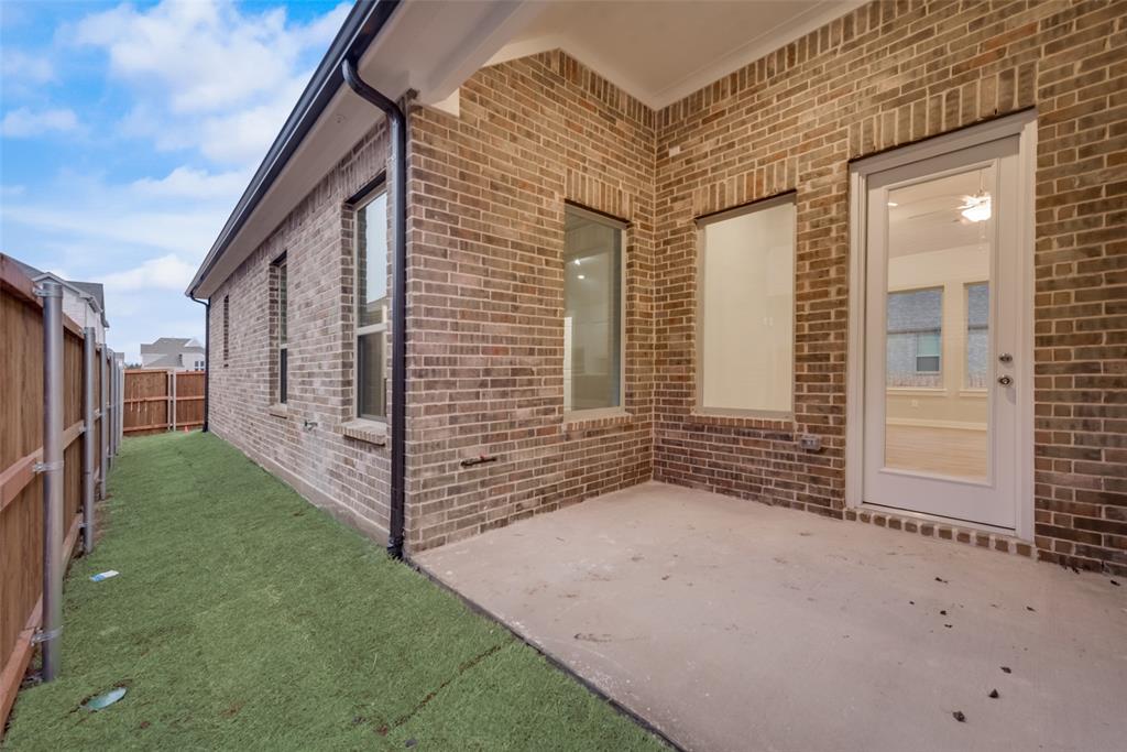 527 Embargo Drive Fate, TX 75189 - Photo 18 of 18 a view of a house with backyard