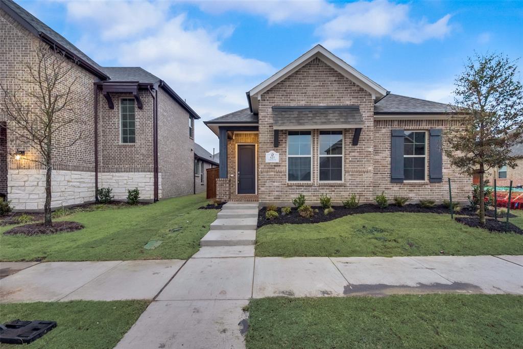 527 Embargo Drive Fate, TX 75189 - Photo 2 of 18 a front view of a house with a yard