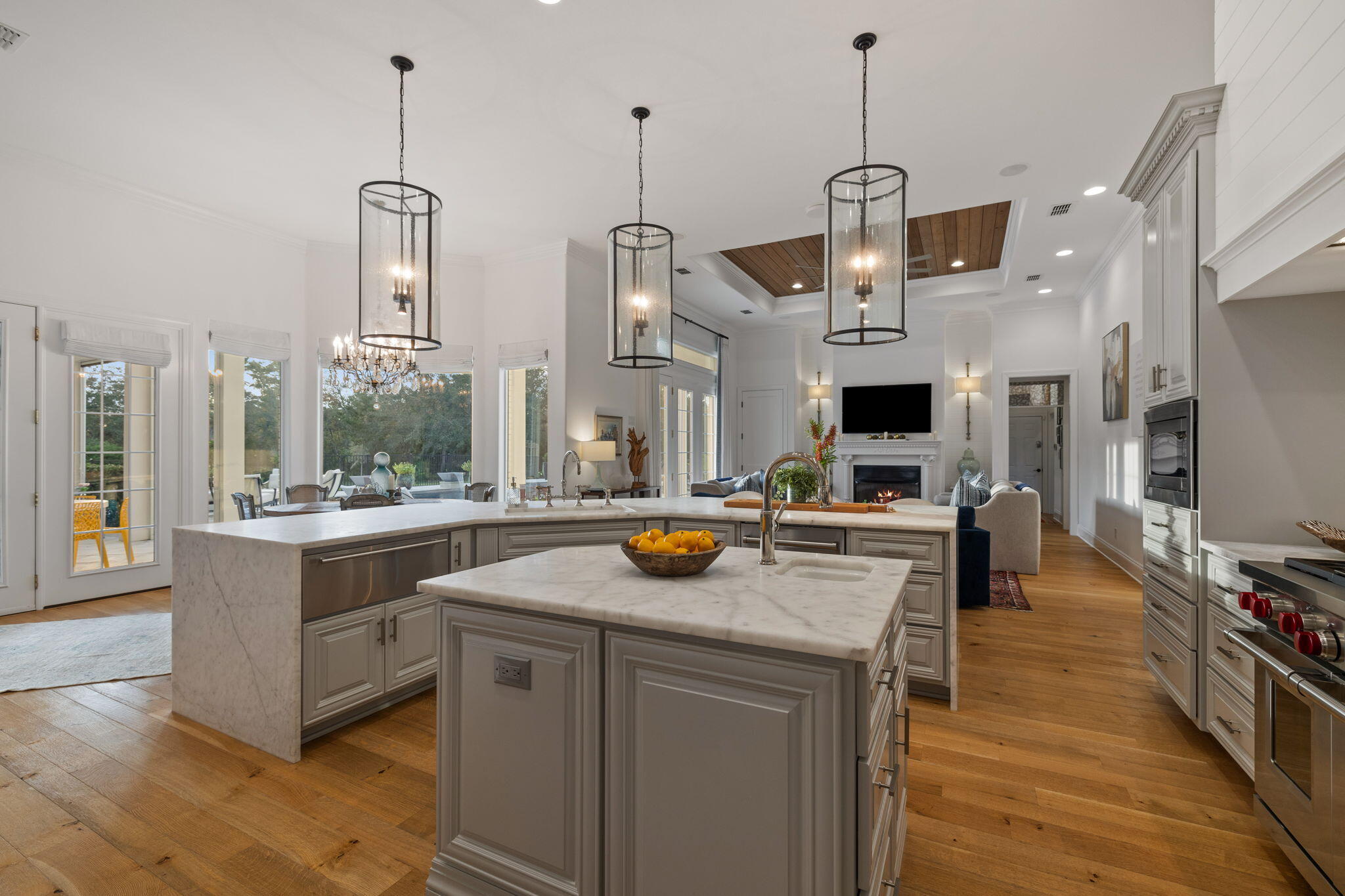 486 Coastal Breeze Drive Freeport, FL 32439 - Photo 12 of 70 a kitchen with stainless steel appliances granite countertop a stove and more cabinets