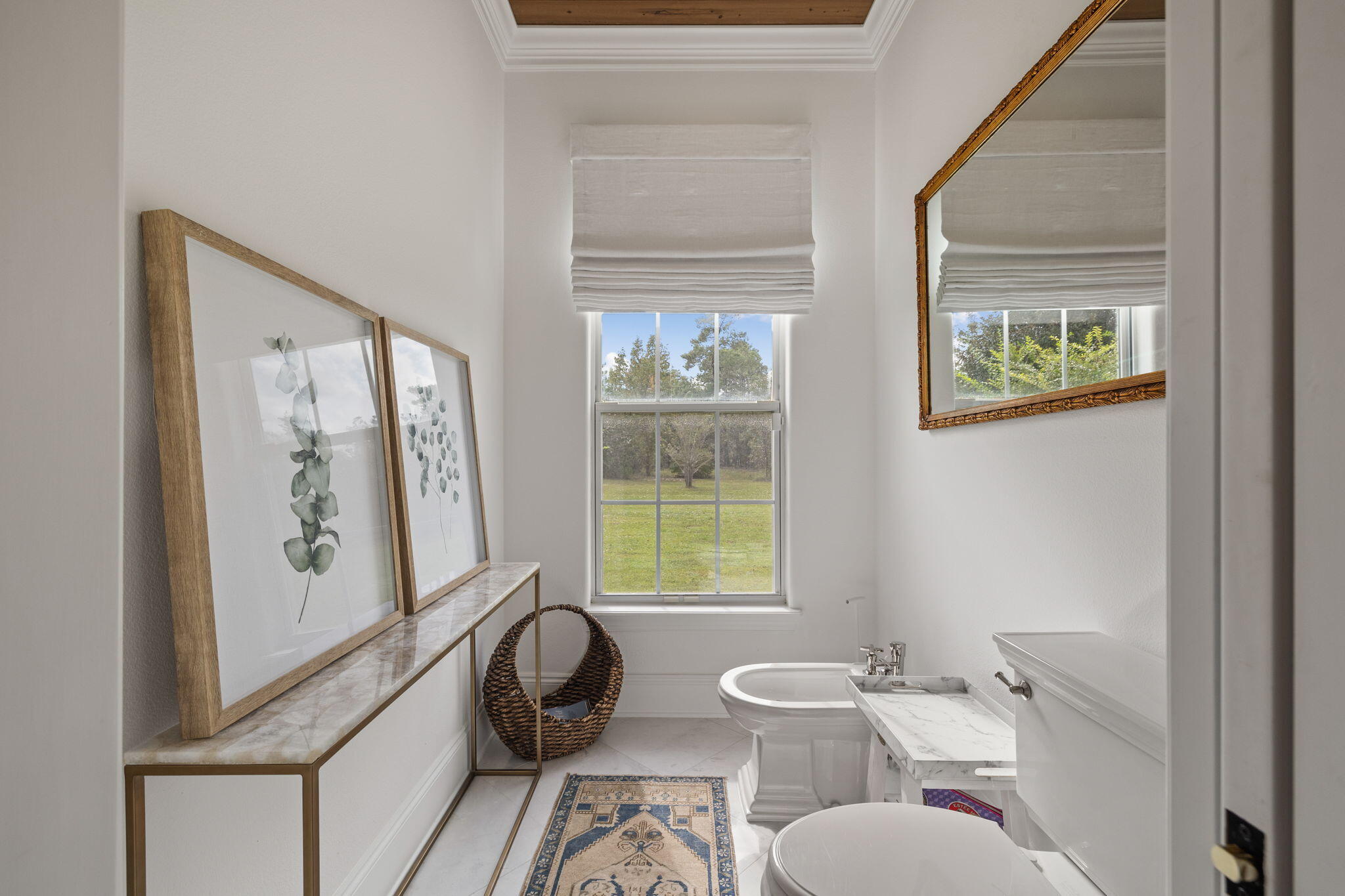 486 Coastal Breeze Drive Freeport, FL 32439 - Photo 26 of 70 a bathroom with a toilet a sink and a window