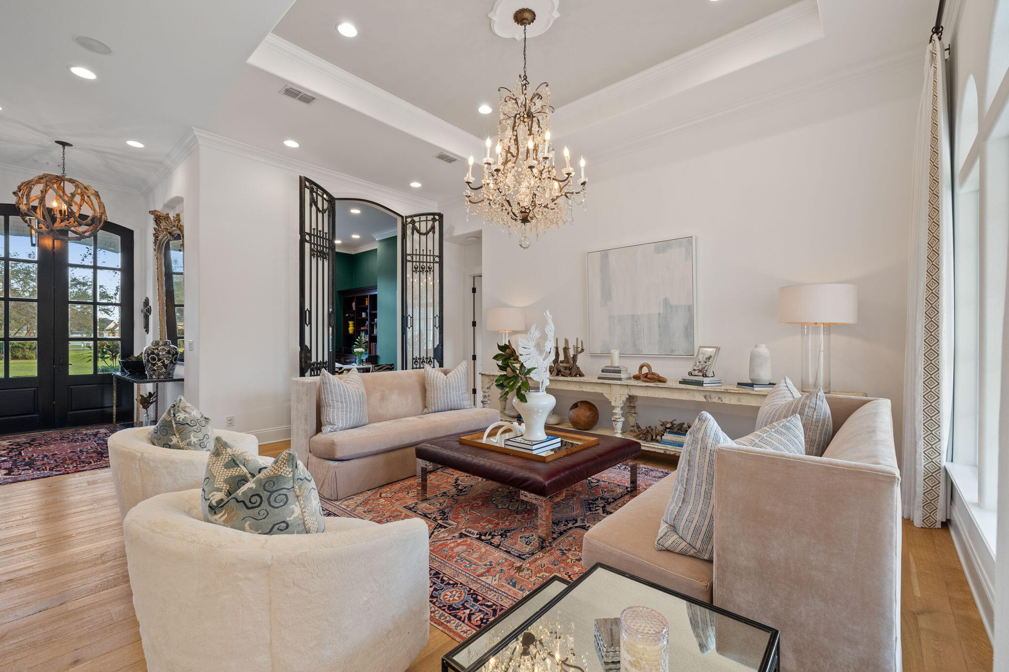 486 Coastal Breeze Drive Freeport, FL 32439 - Photo 4 of 70 a living room with furniture and a chandelier
