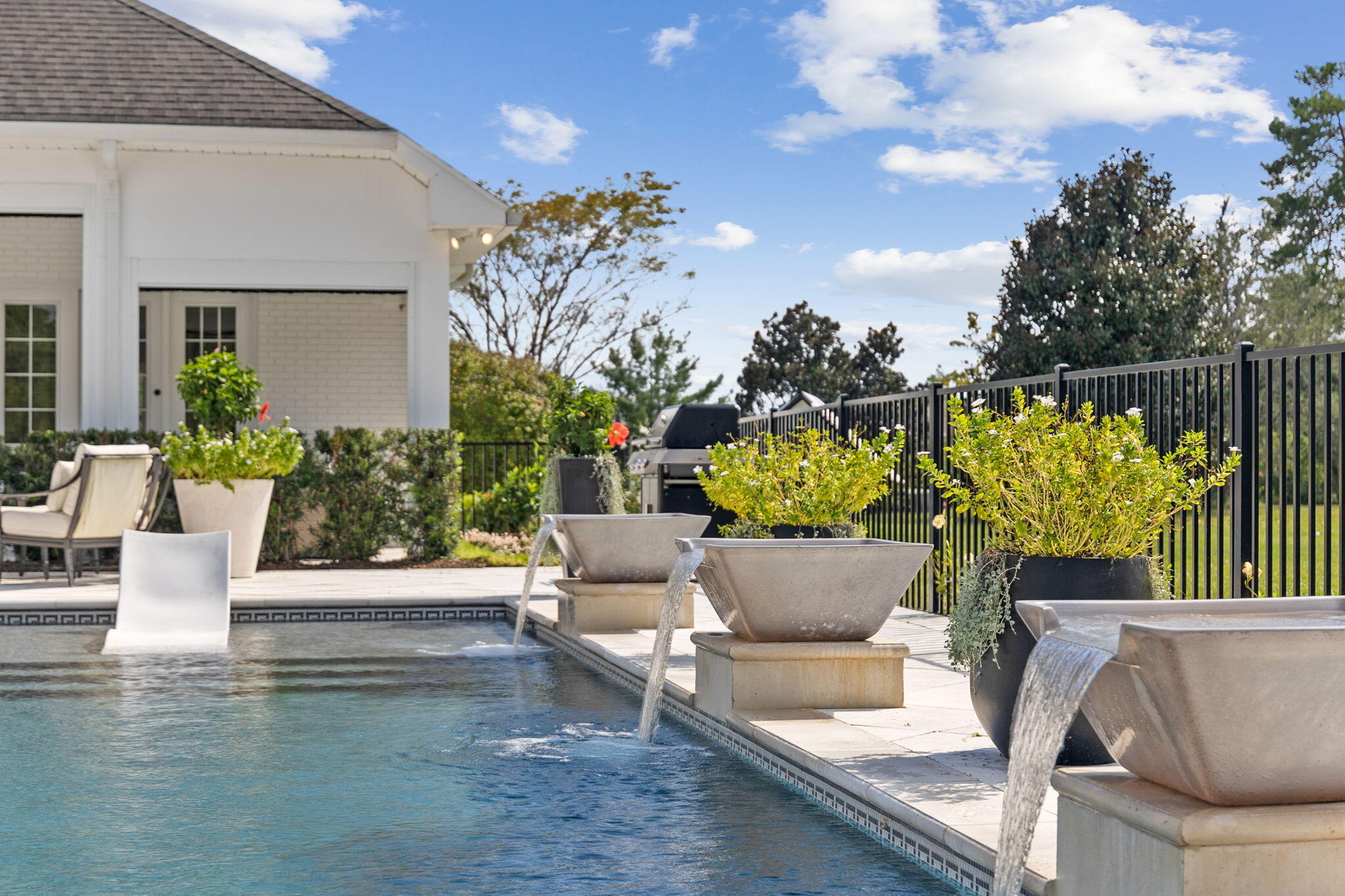 486 Coastal Breeze Drive Freeport, FL 32439 - Photo 47 of 70 a view of a patio with couches and potted plants