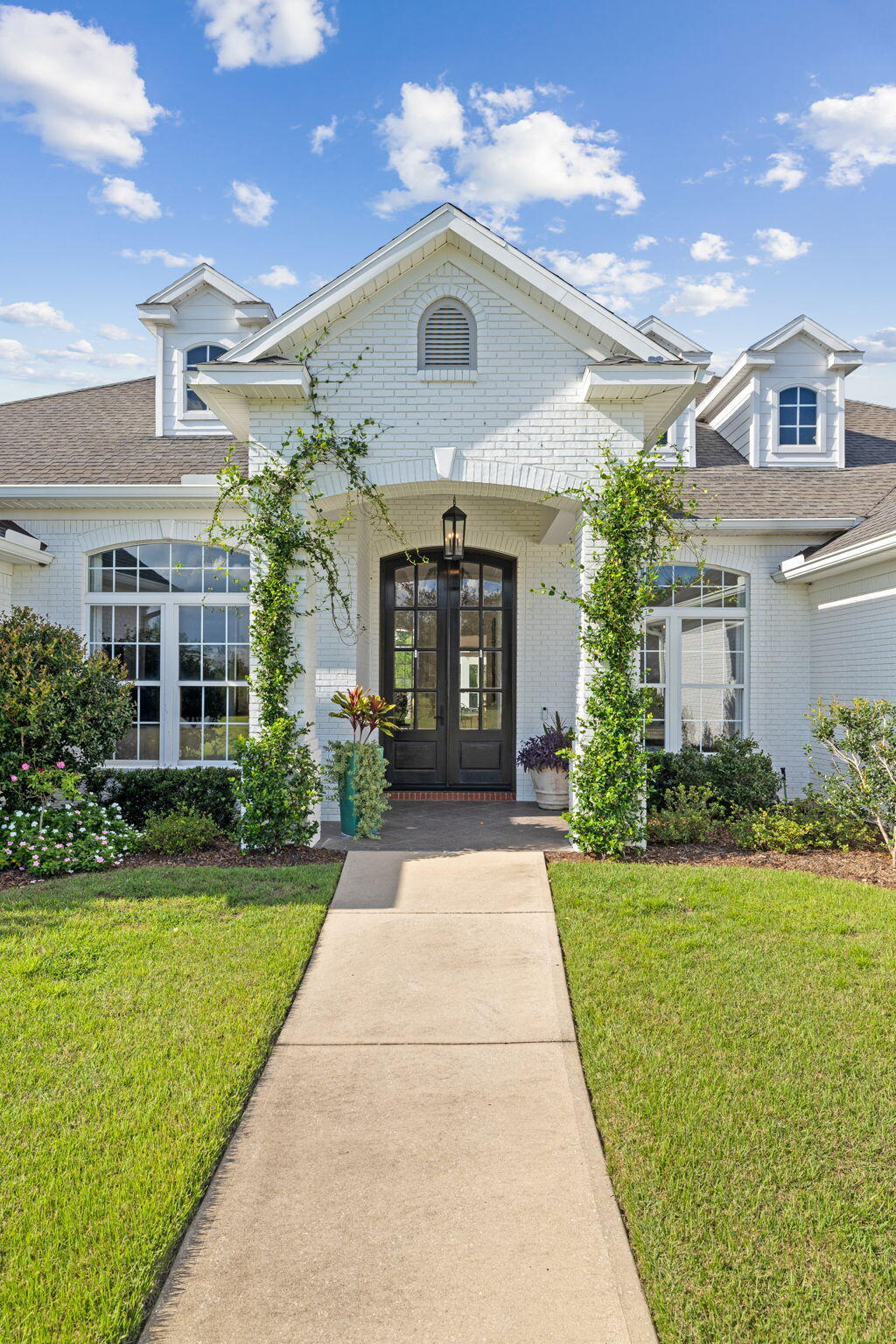 486 Coastal Breeze Drive Freeport, FL 32439 - Photo 63 of 70 a front view of a house with a yard