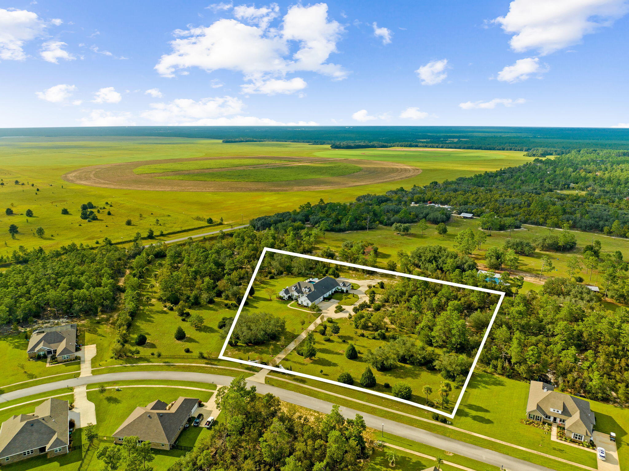 486 Coastal Breeze Drive Freeport, FL 32439 - Photo 66 of 70 a view of a swimming pool with a outdoor seating and yard
