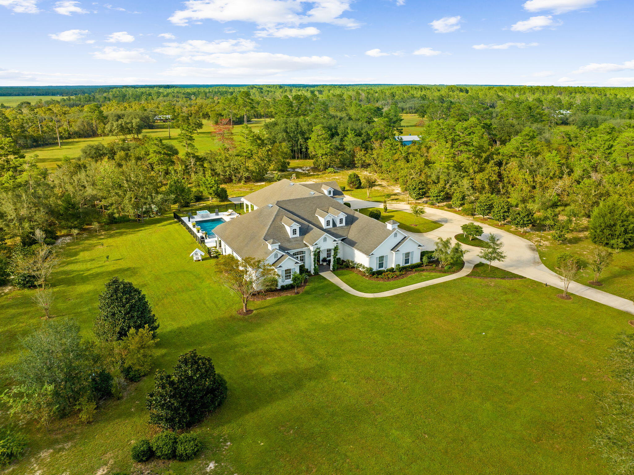 486 Coastal Breeze Drive Freeport, FL 32439 - Photo 67 of 70 a view of a lake with lawn chairs