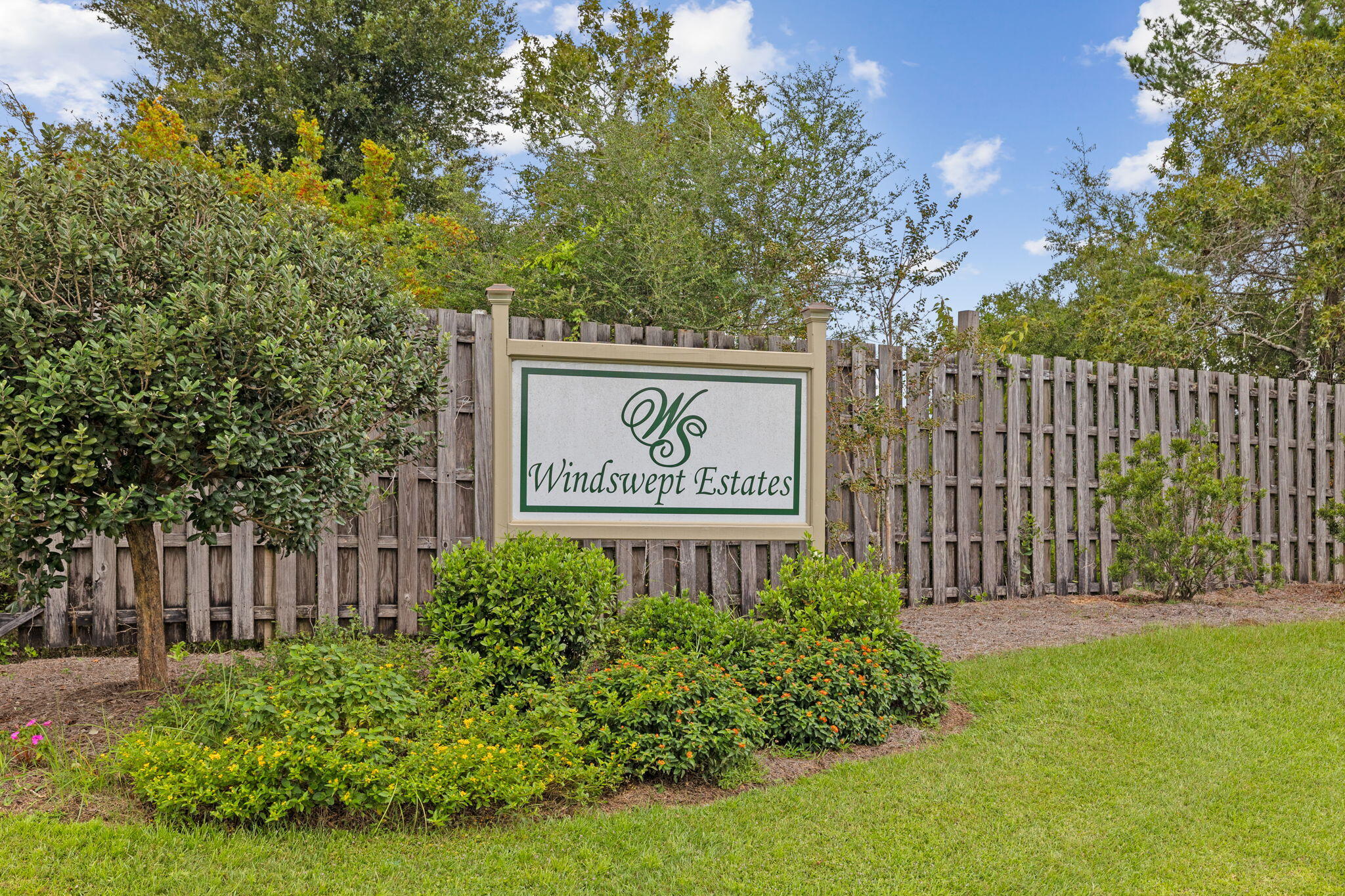 486 Coastal Breeze Drive Freeport, FL 32439 - Photo 70 of 70 a sign on the side of the road