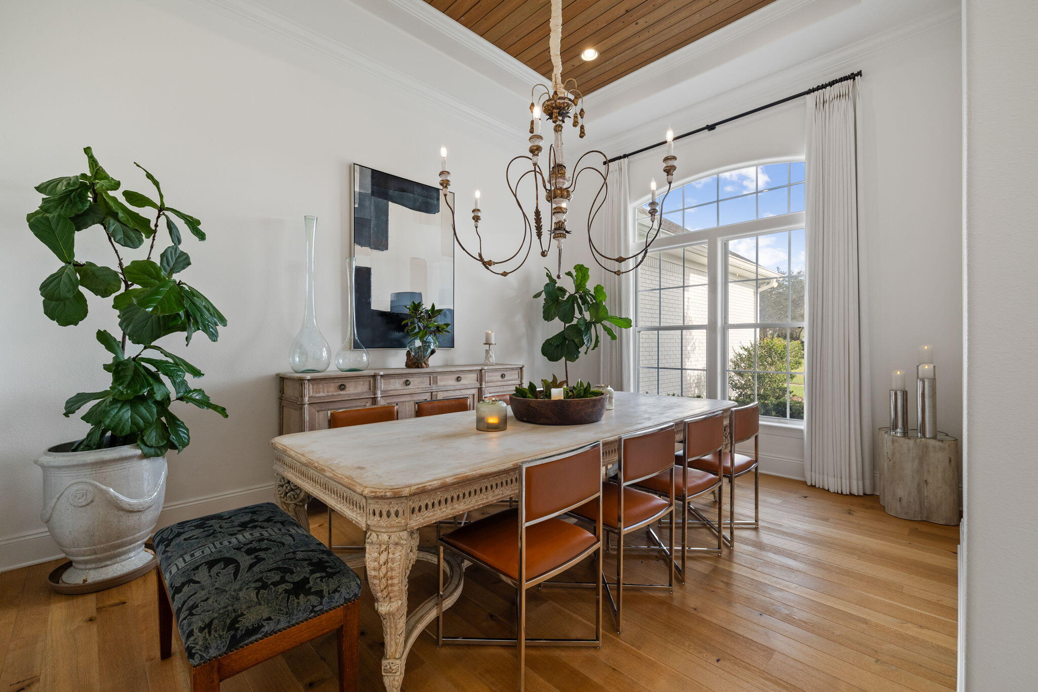 486 Coastal Breeze Drive Freeport, FL 32439 - Photo 7 of 70 a view of a dining room with furniture a chandelier and wooden floor