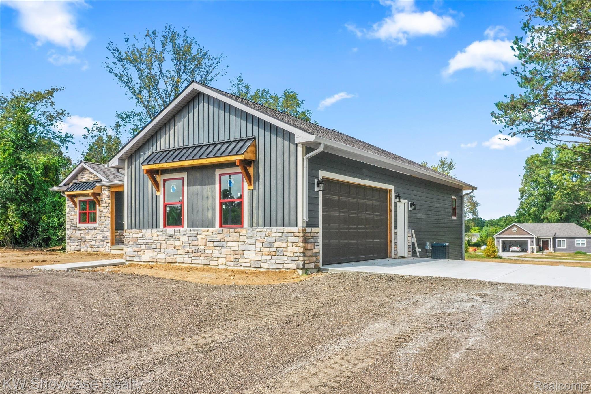 7661 East Highland Road Howell, MI 48855 - Photo 2 of 47 DJI_0361.jpg