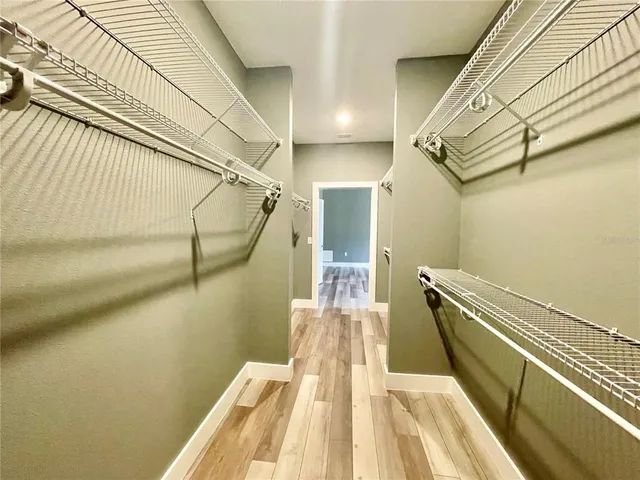 a en suite bathroom with a sink and a mirror