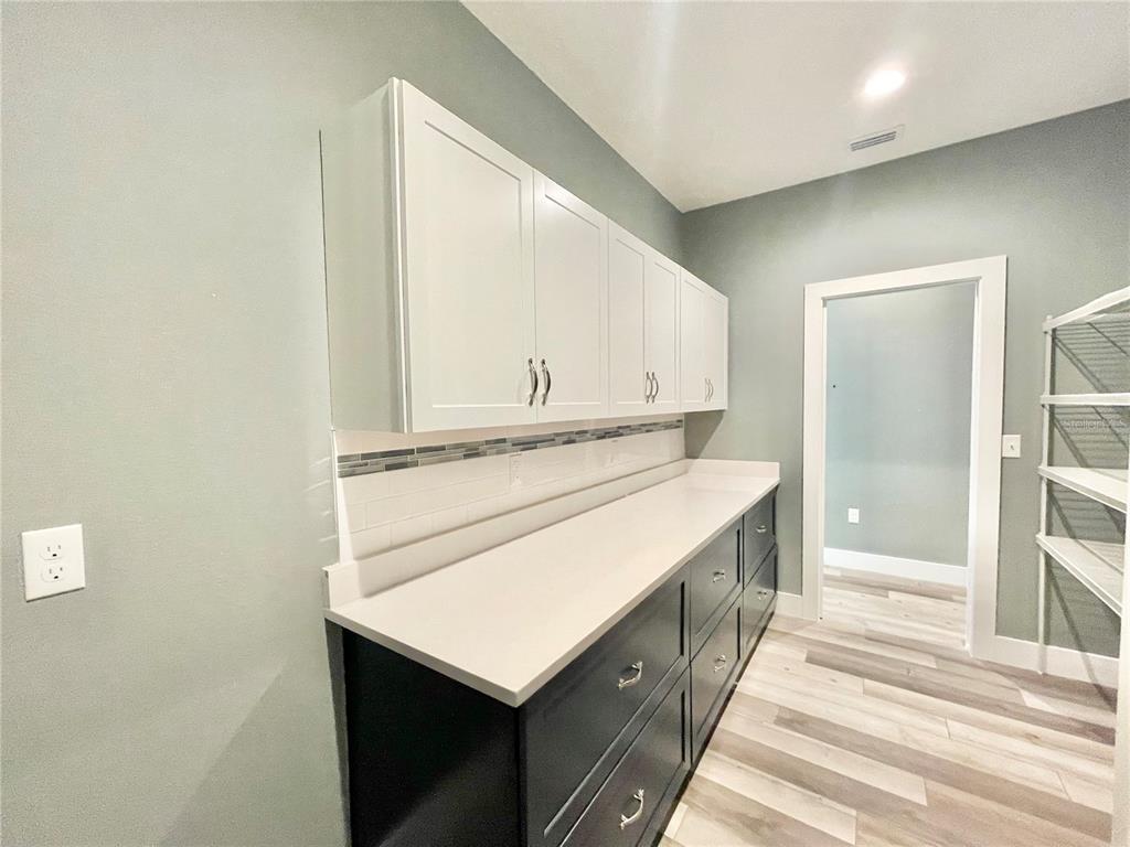 10620 Southwest 10th Terrace Micanopy, FL 32667 - Photo 33 of 58 a bathroom with a sink and a mirror
