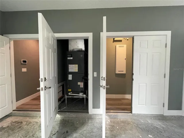 a view of a backyard with sitting area