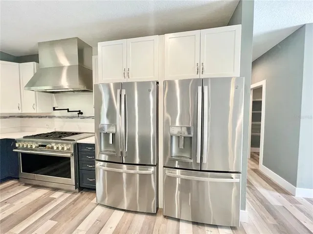 a kitchen with a sink and a window