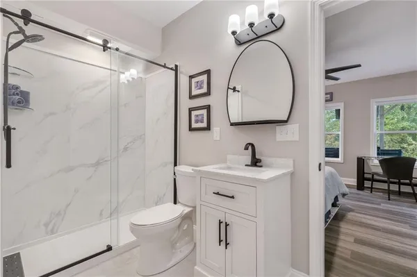 a view of room with wooden floor