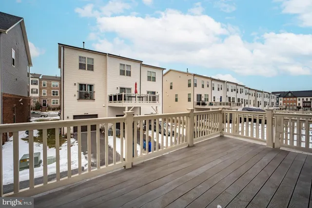 a view of balcony with wooden floor