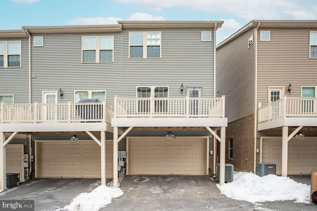 a front view of a building with glass windows