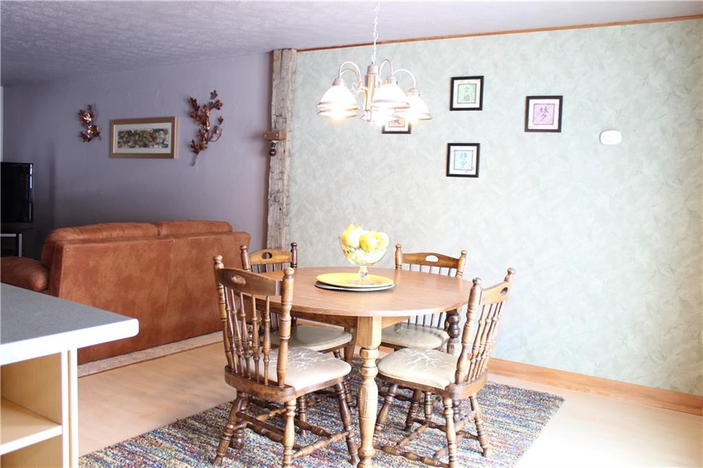 301 Partridge Run Road Gibsonia, PA 15044 - Photo 8 of 25 From the dining room you can access the large deck that looks out over the yard.