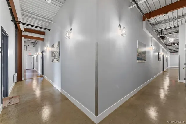 a view of hallway with livingroom