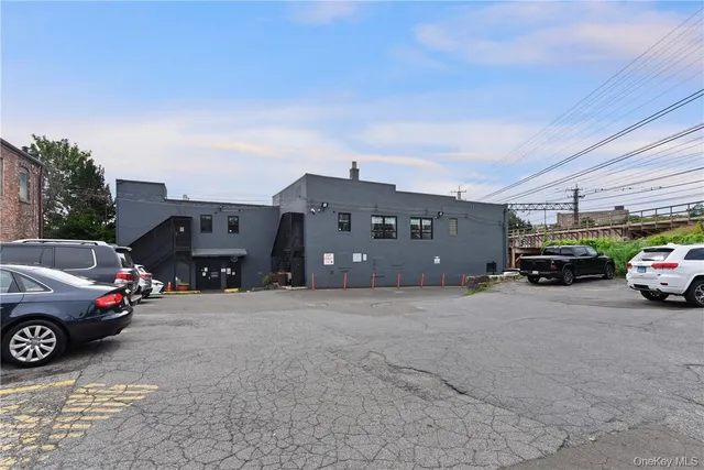a view of parking space and parking