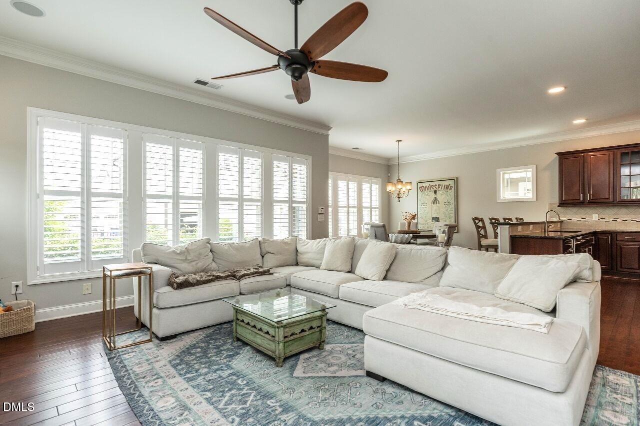 1572 Rodessa Run Raleigh, NC 27607 - Photo 16 of 39 a living room with furniture and a large window