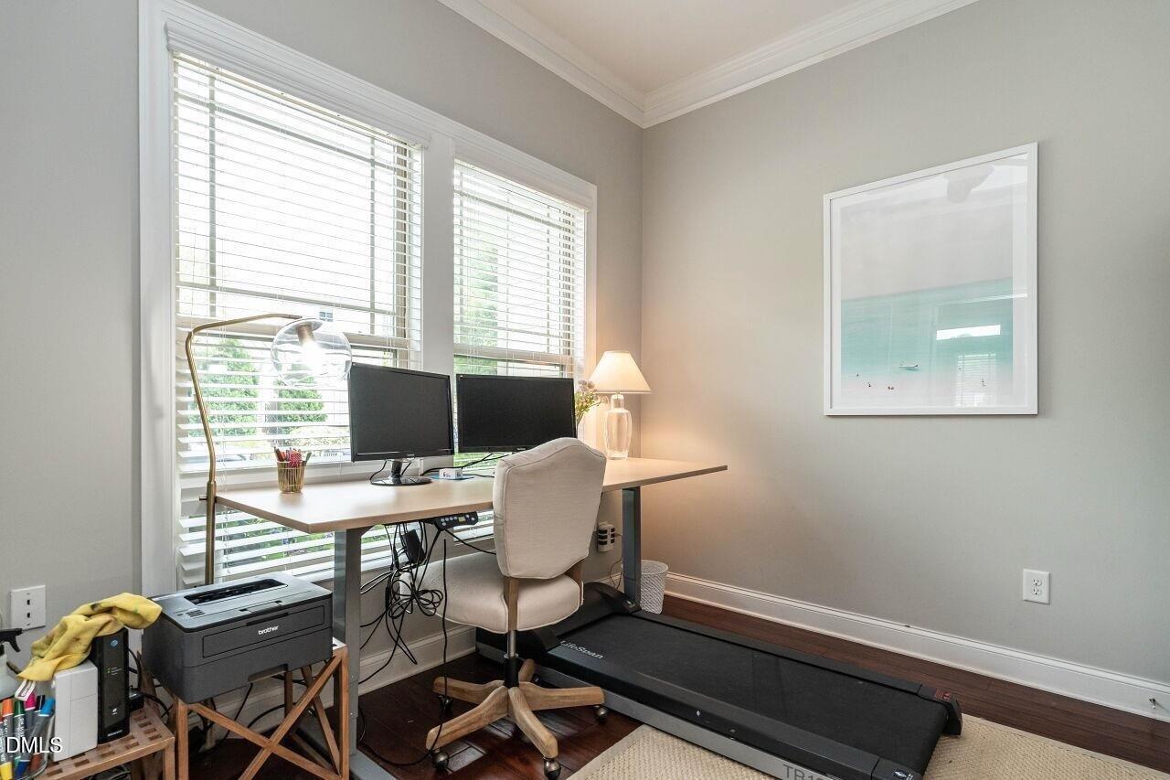 1572 Rodessa Run Raleigh, NC 27607 - Photo 20 of 39 a view of a workspace with furniture and a window
