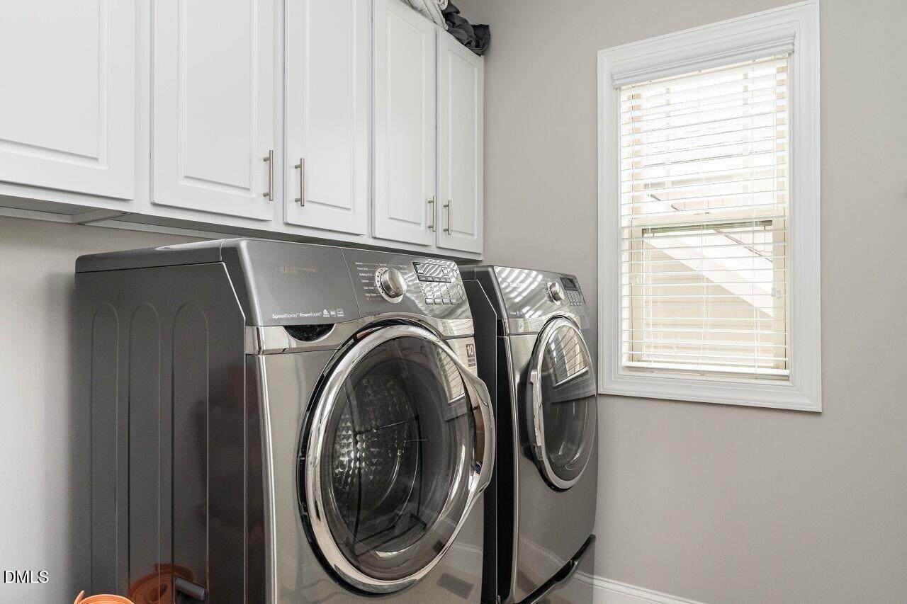 1572 Rodessa Run Raleigh, NC 27607 - Photo 30 of 39 a utility room with dryer and washer