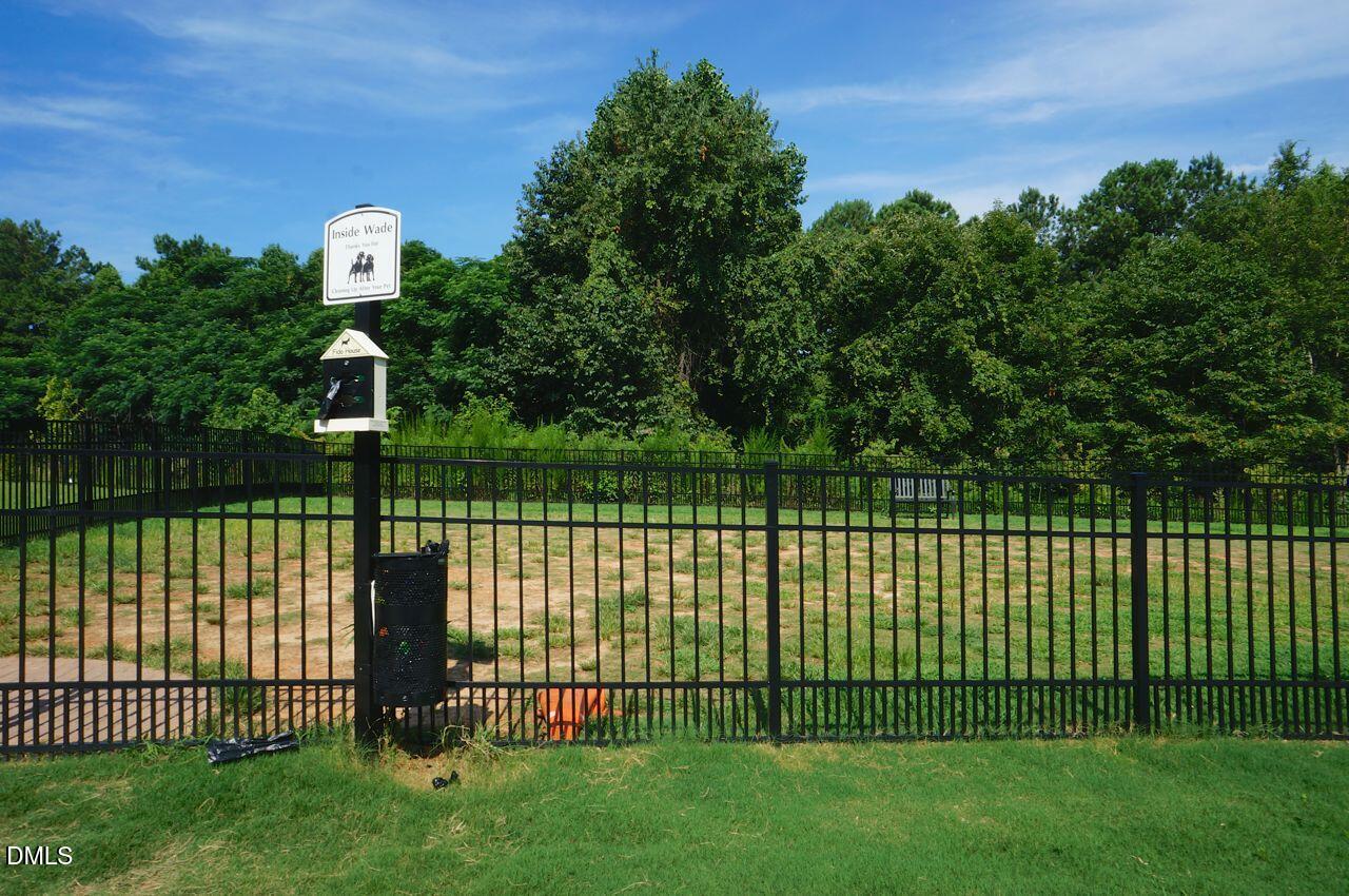 1572 Rodessa Run Raleigh, NC 27607 - Photo 38 of 39 a view of a green field in front of a house