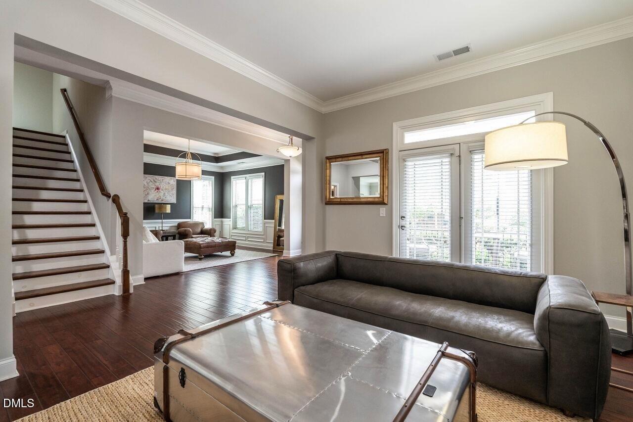 1572 Rodessa Run Raleigh, NC 27607 - Photo 8 of 39 a living room with furniture and a large window