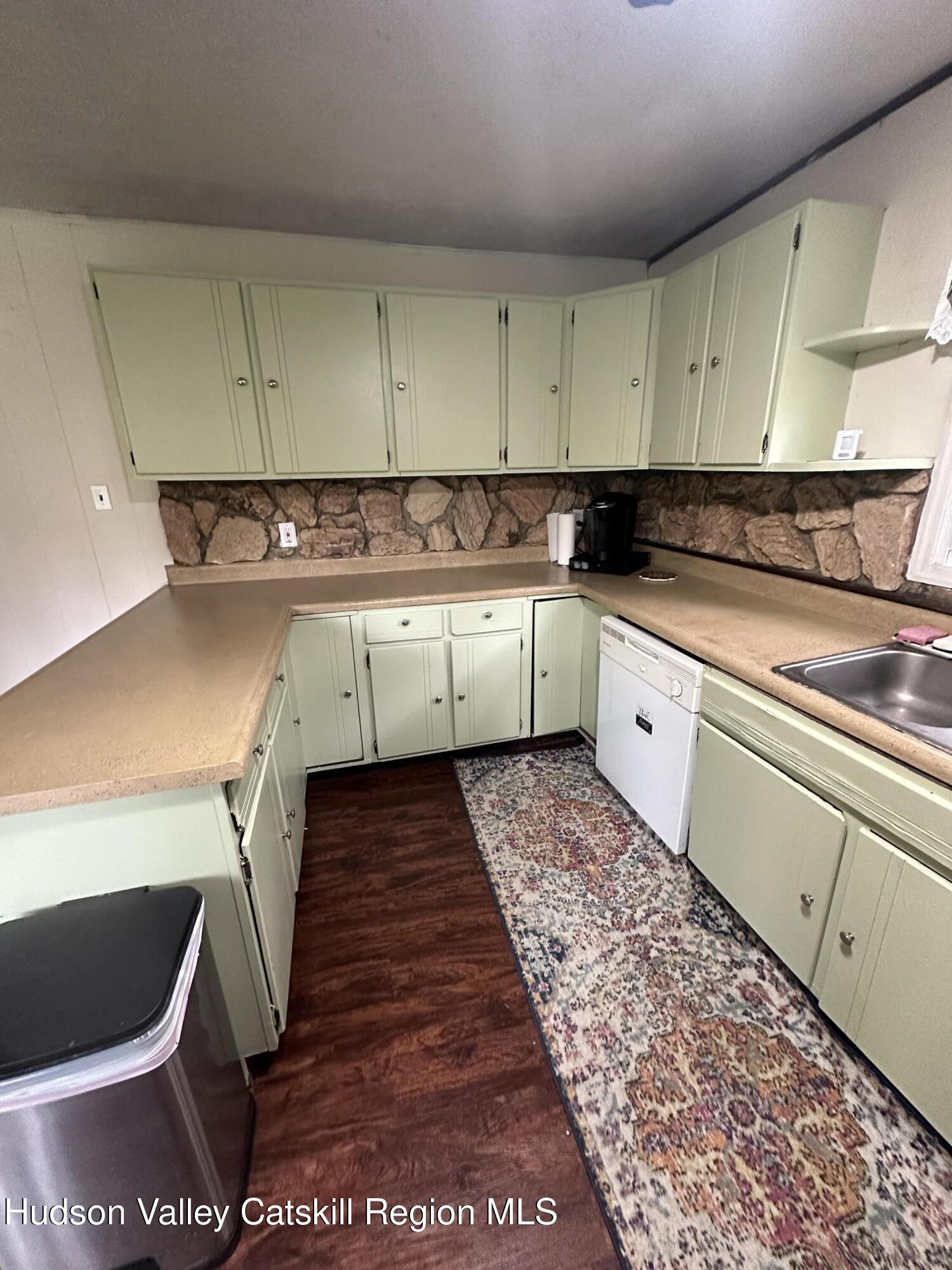 1640 Co Rte 13 Brainard, NY 12024 - Photo 7 of 23 a kitchen with a sink and cabinets