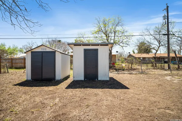 a view of a outdoor space in front of a house