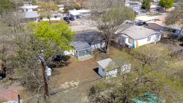 a view of houses with yard