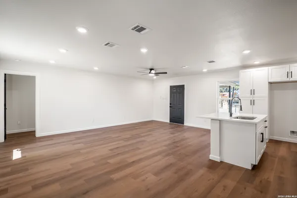 a view of kitchen with wooden floor