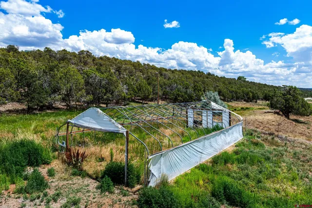 a view of a houses with a yard